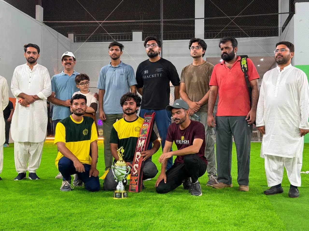 Winning team with trophy